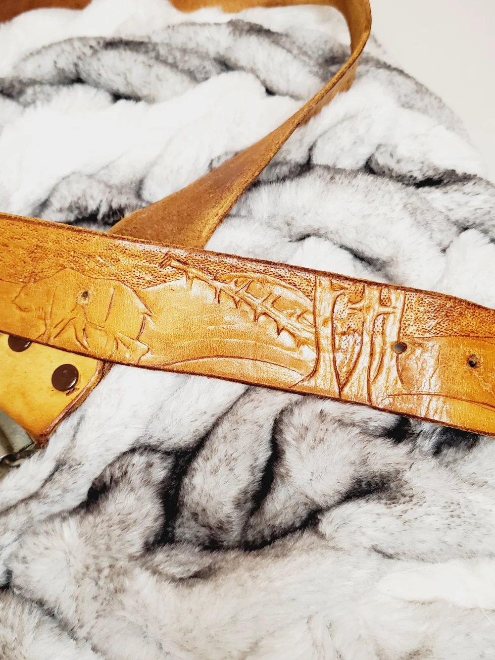 Vintage hand-tooled leather belt features a distinctive Viking Valknut symbo